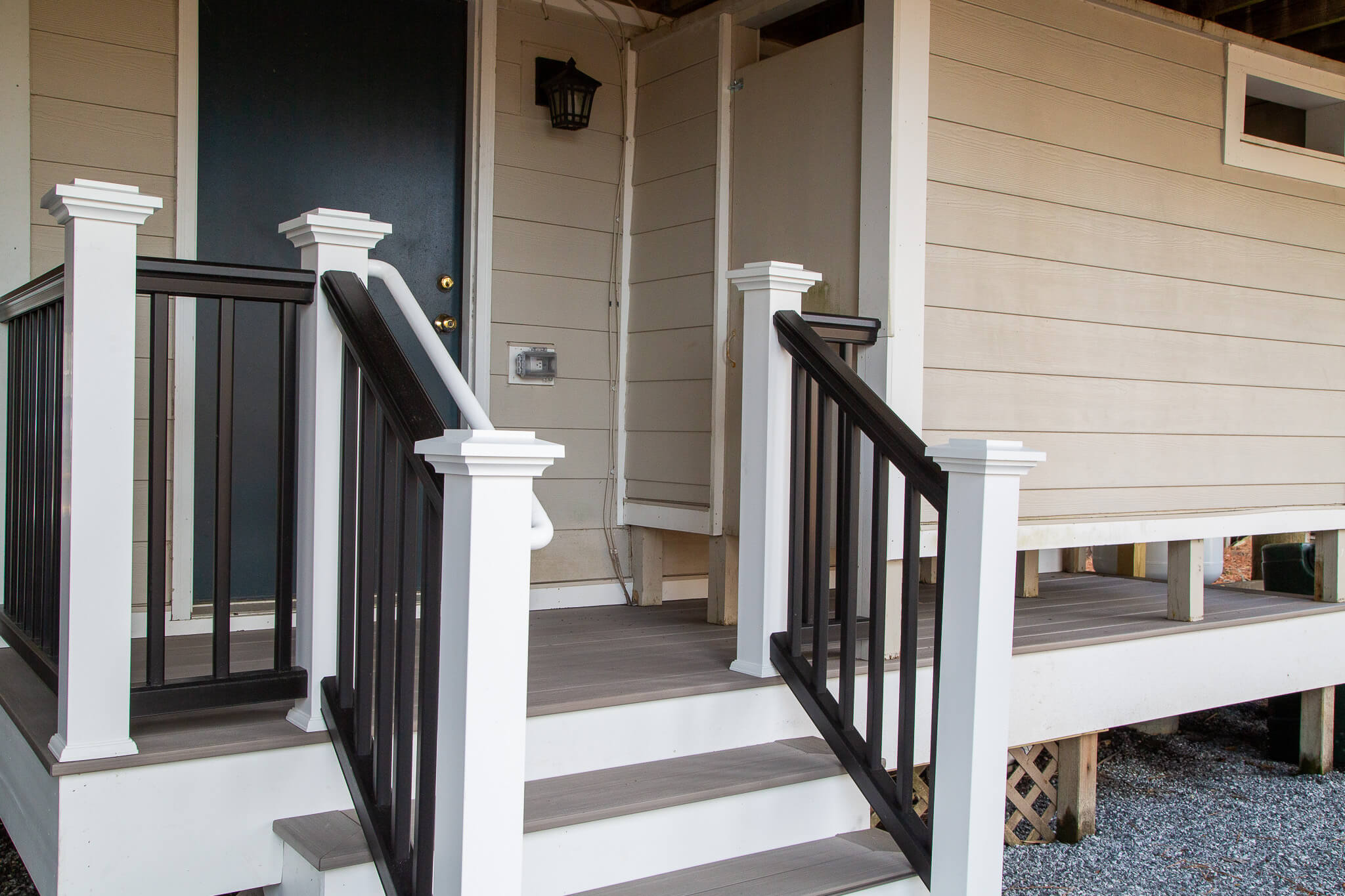 Deck Renovation in Campbell Place, Bethany Beach DE - Table with Six Wooden Chairs and Stainless Steel Grill