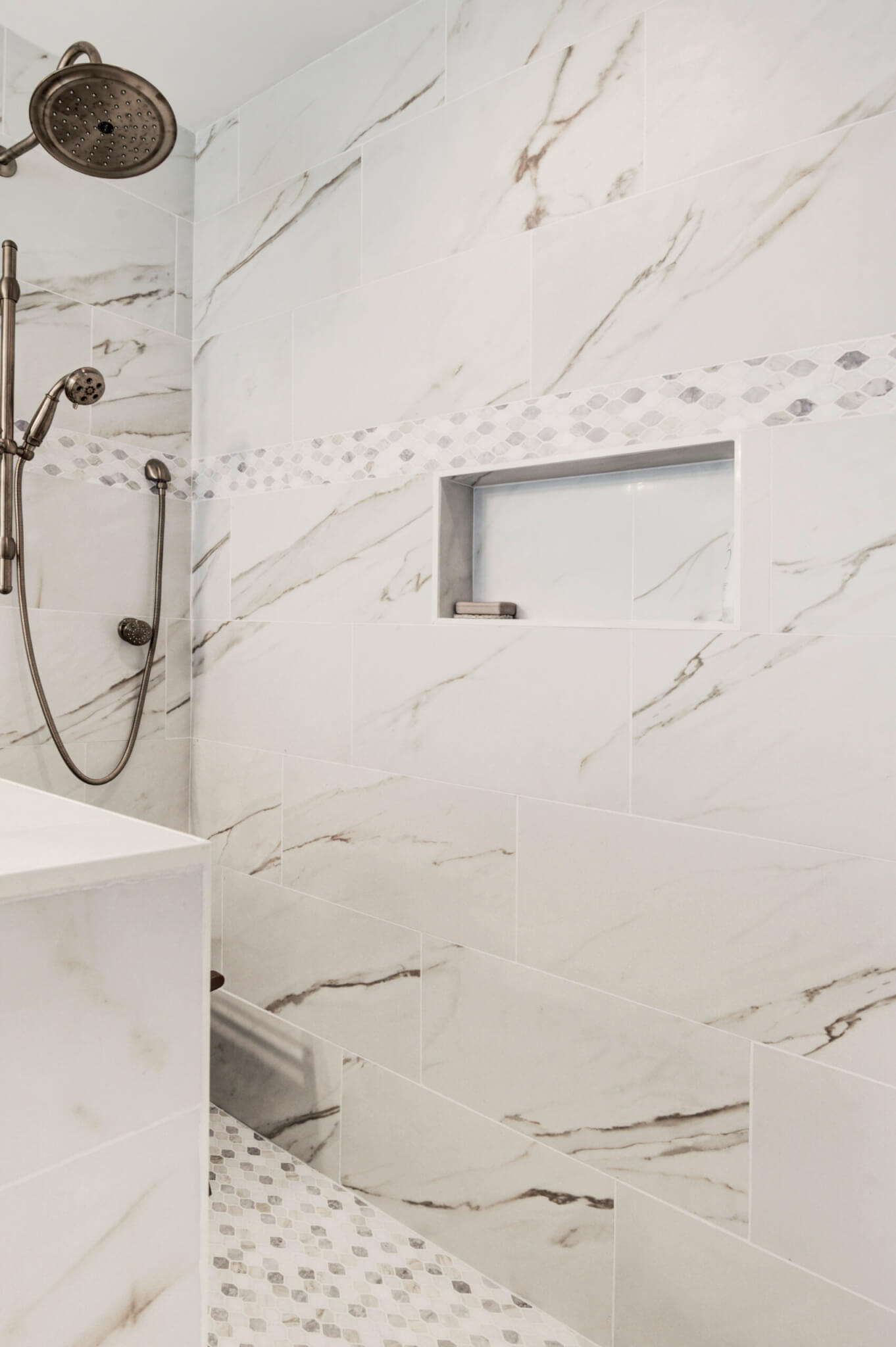 Bathroom Remodel in Bethany Lakes, Bethany Beach DE with White Vanity, Tub, Arpell Azul Mosaic Wall Tiles, Snape Gloss Tiles