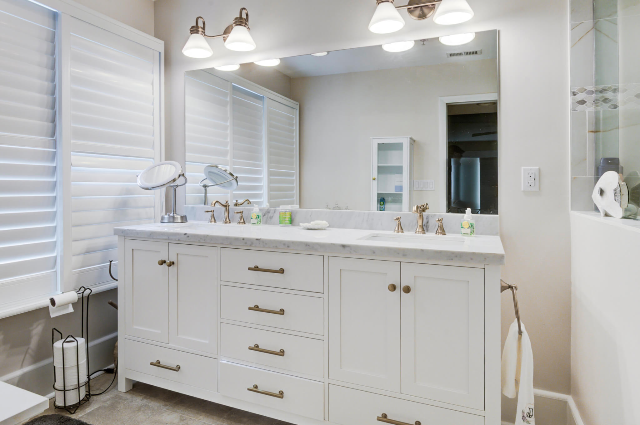 Bathroom Remodel in Bethany Lakes, Bethany Beach DE with White Vanity, Tub, Arpell Azul Mosaic Wall Tiles, Snape Gloss Tiles