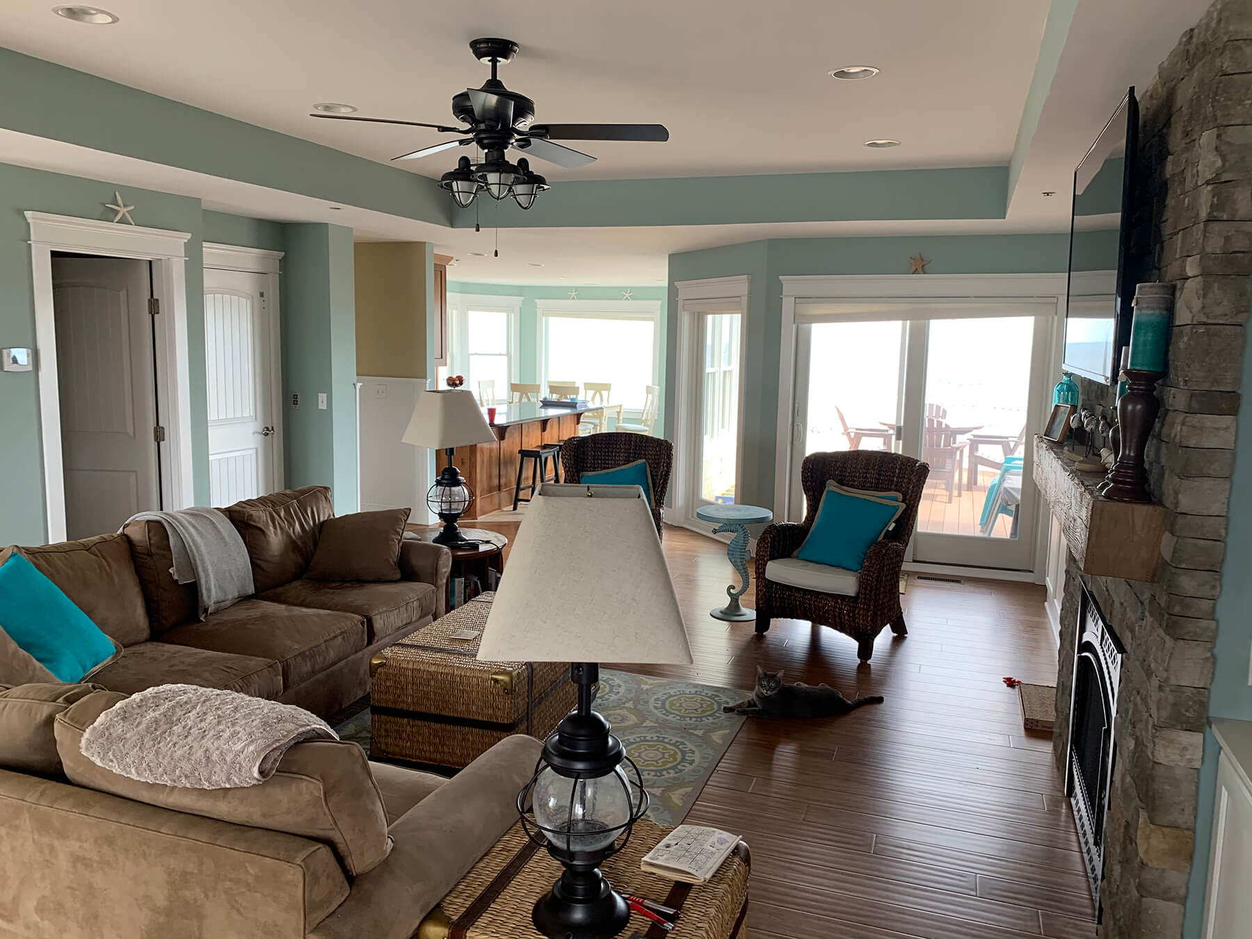 Deck Renovation in Campbell Place, Bethany Beach DE - Table with Six Wooden Chairs and Stainless Steel Grill