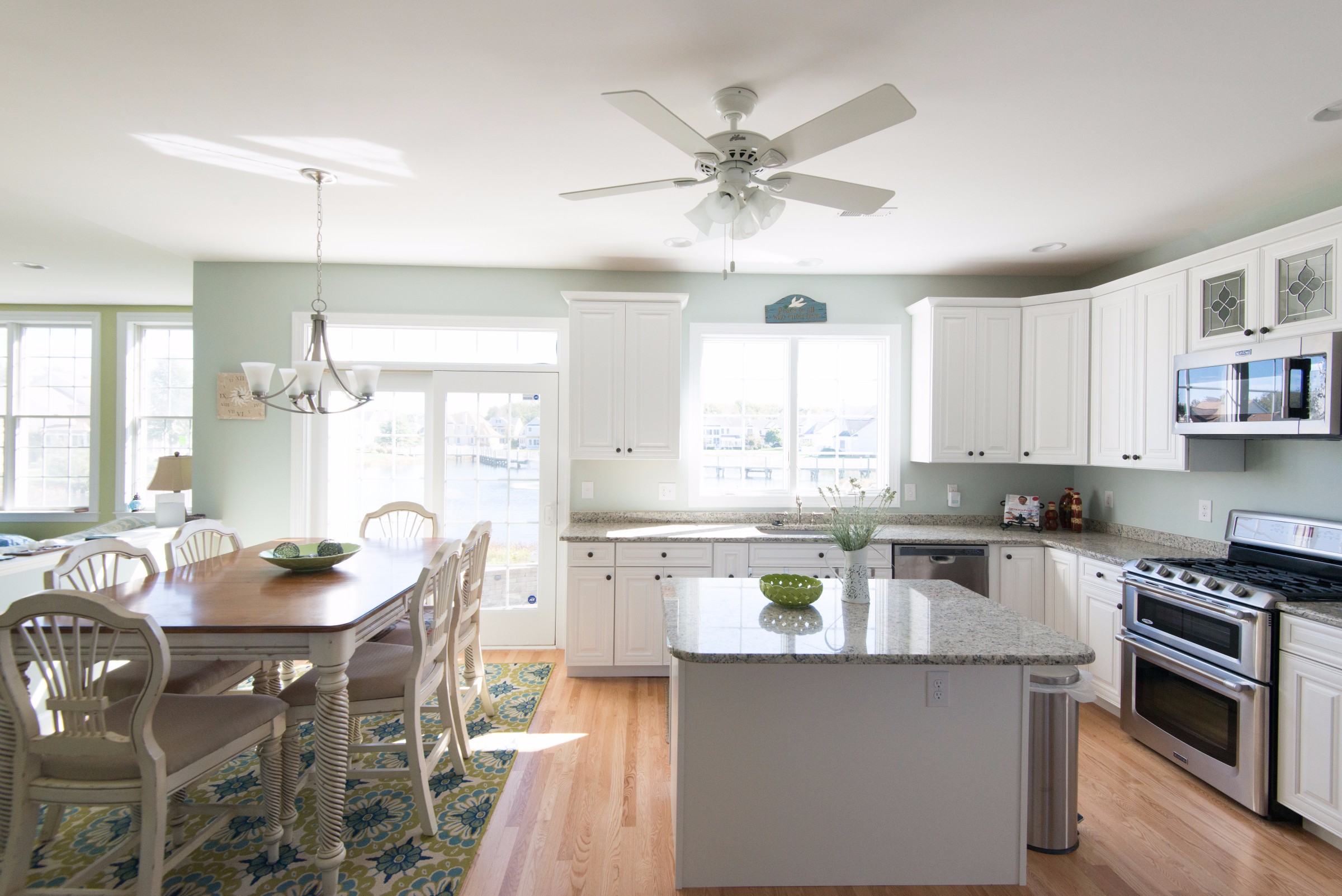 Kitchen Remodel in Bethany Lakes, Bethany Beach DE with Hardwood Flooring, Recessed Can Lights and Chandelier