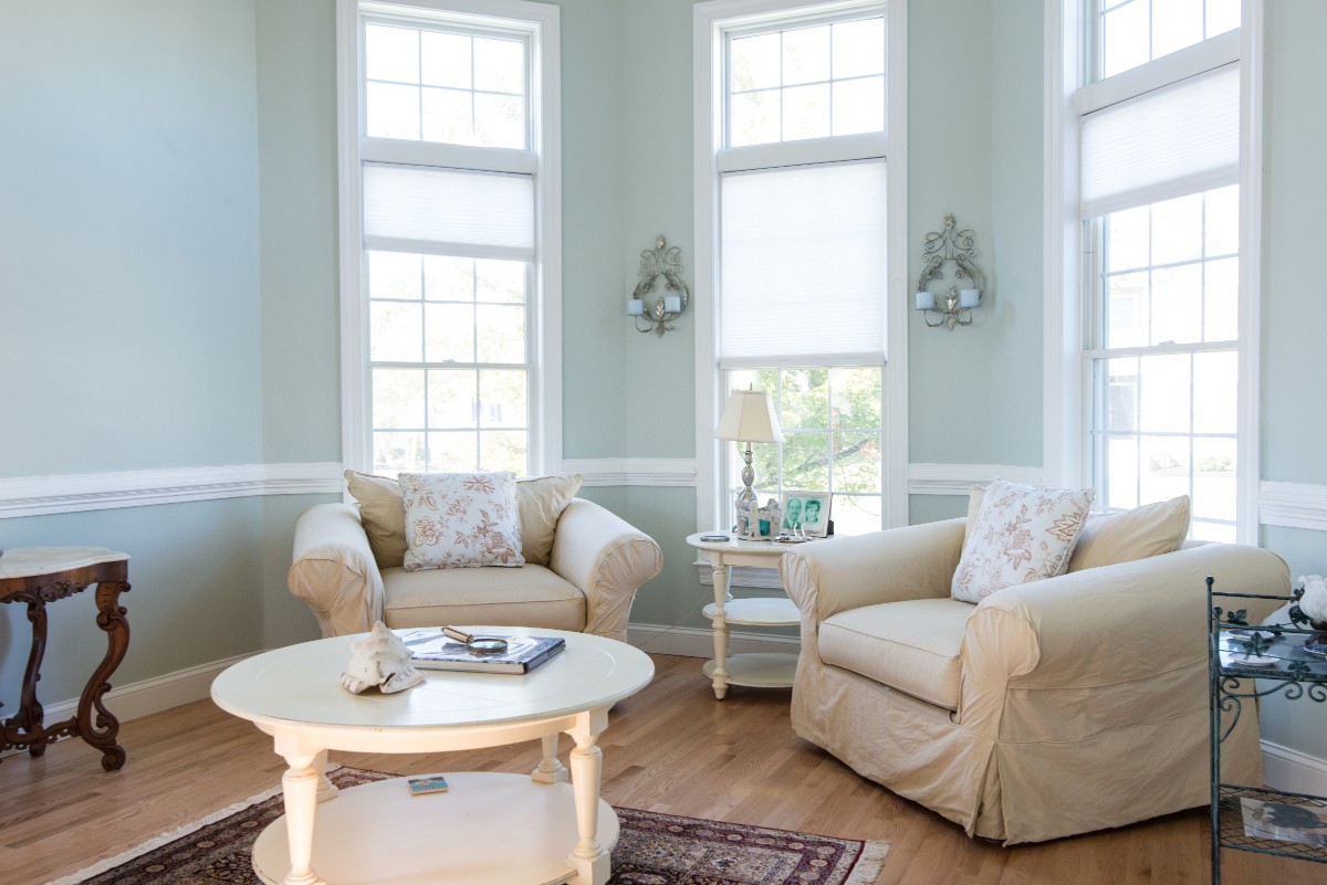 Bethany Lakes Renovation Bethany Beach, DE with Armchairs, White Round Coffee Table and Light Sea Foam Wall Paint