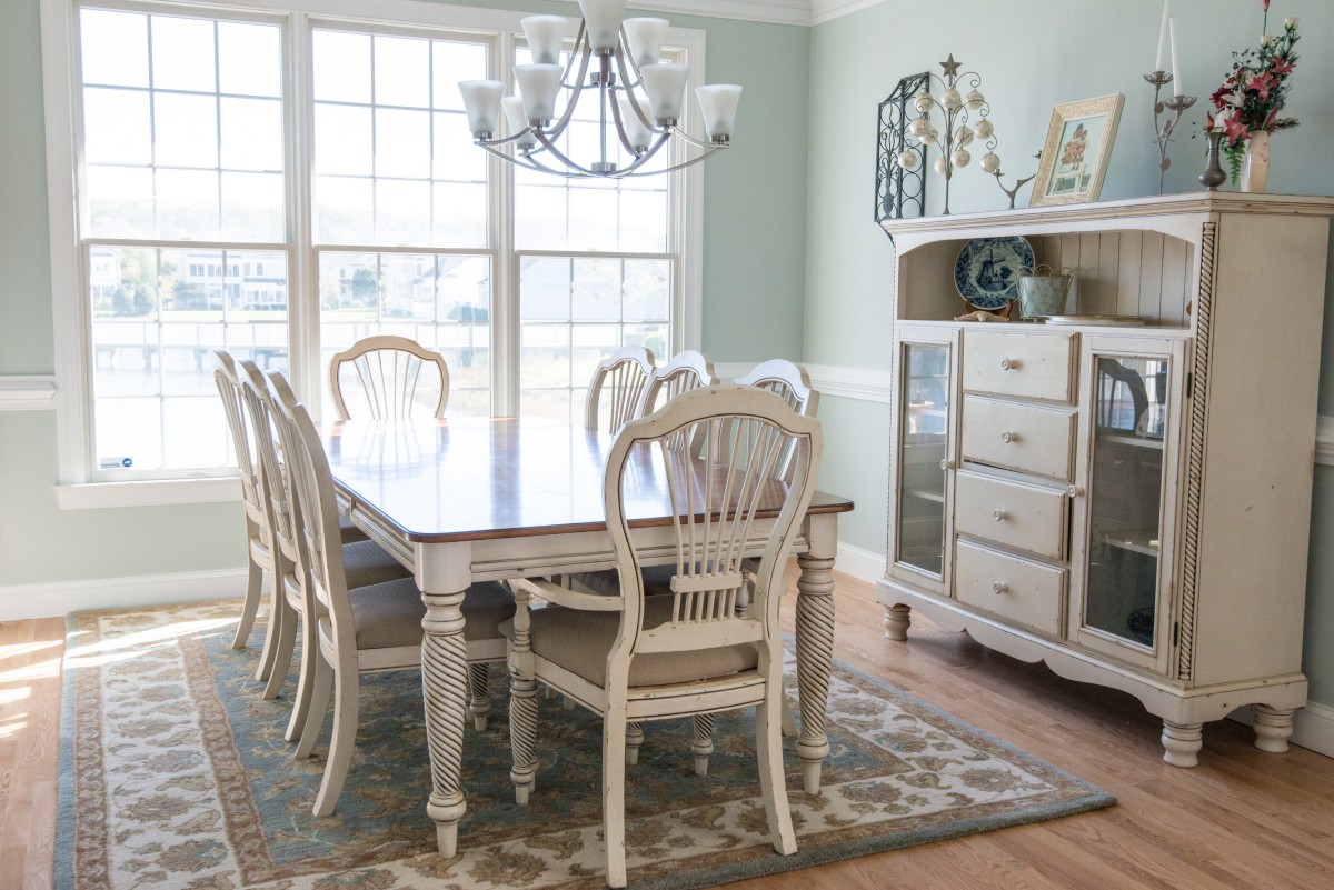 Bethany Lakes Renovation Bethany Beach, DE with Vintage Furniture, Dining Table, Wood Flooring, Carpet and Large Windows