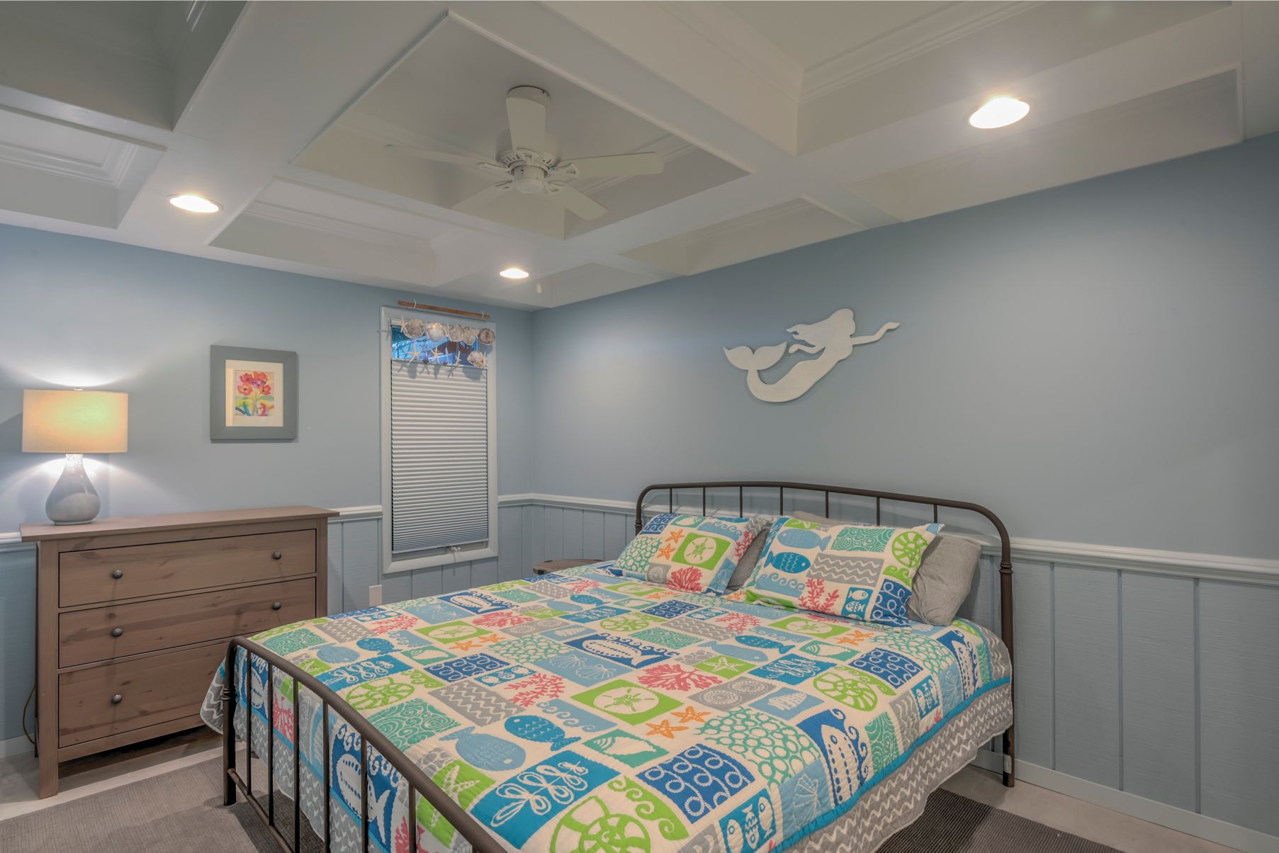 Renovation in Campbell Place, Bethany Beach DE - Bedroom with Driftwood Gray Wall Paint and White Mermaid Above Bed
