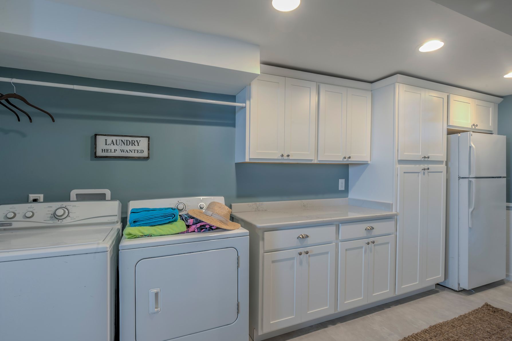 Renovation in Campbell Place, Bethany Beach DE - Laundry Area with Help Wanted Sign