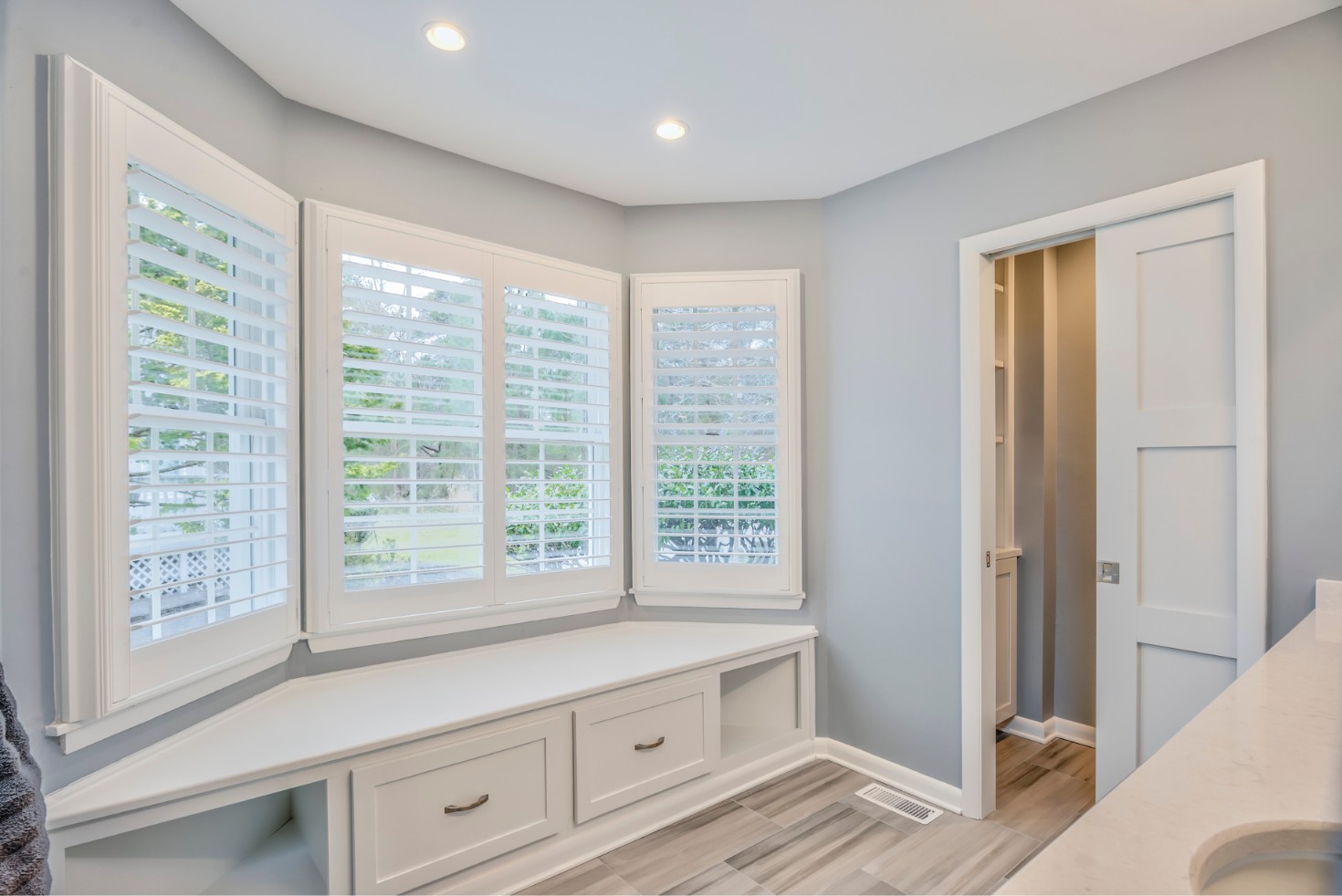 Canal Way Renovation in Bethany Beach DE - Bathroom with Large Window Side Bench Seat