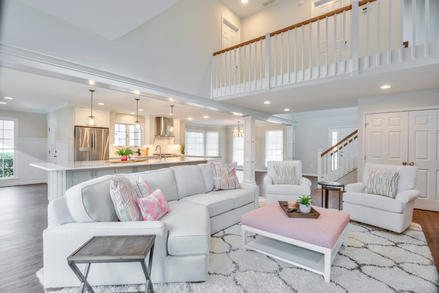 Canal Way Renovation in Bethany Beach DE - Great Room with Beige Sofa and Armchairs