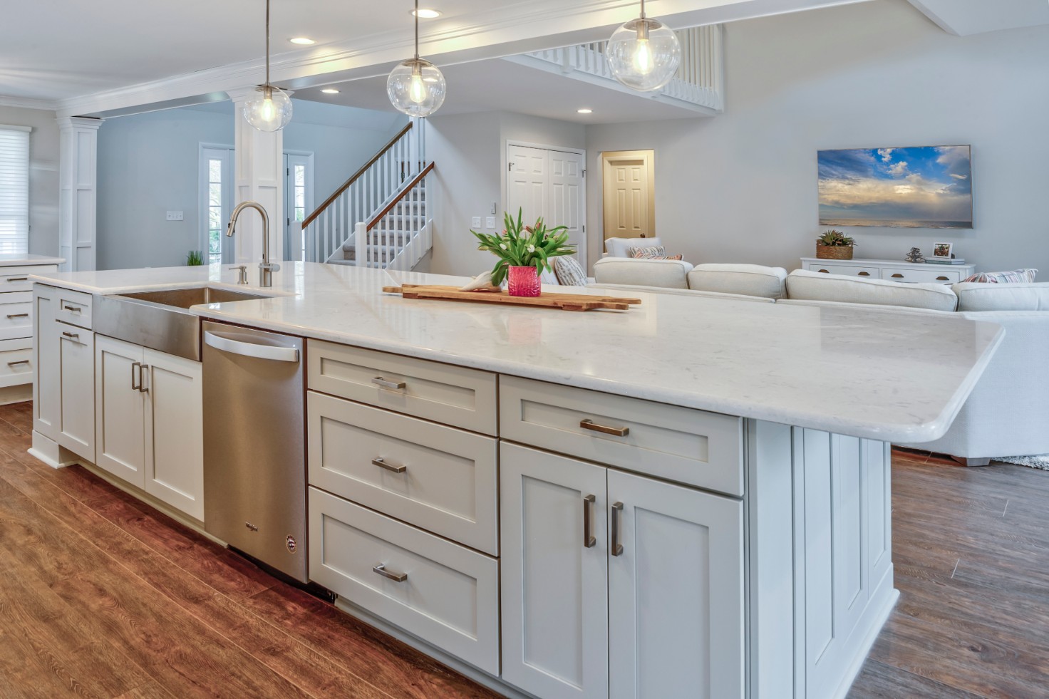 Canal Way Renovation in Bethany Beach DE - Kitchen with Center Island with Farm Sink and White Shaker Cabinets