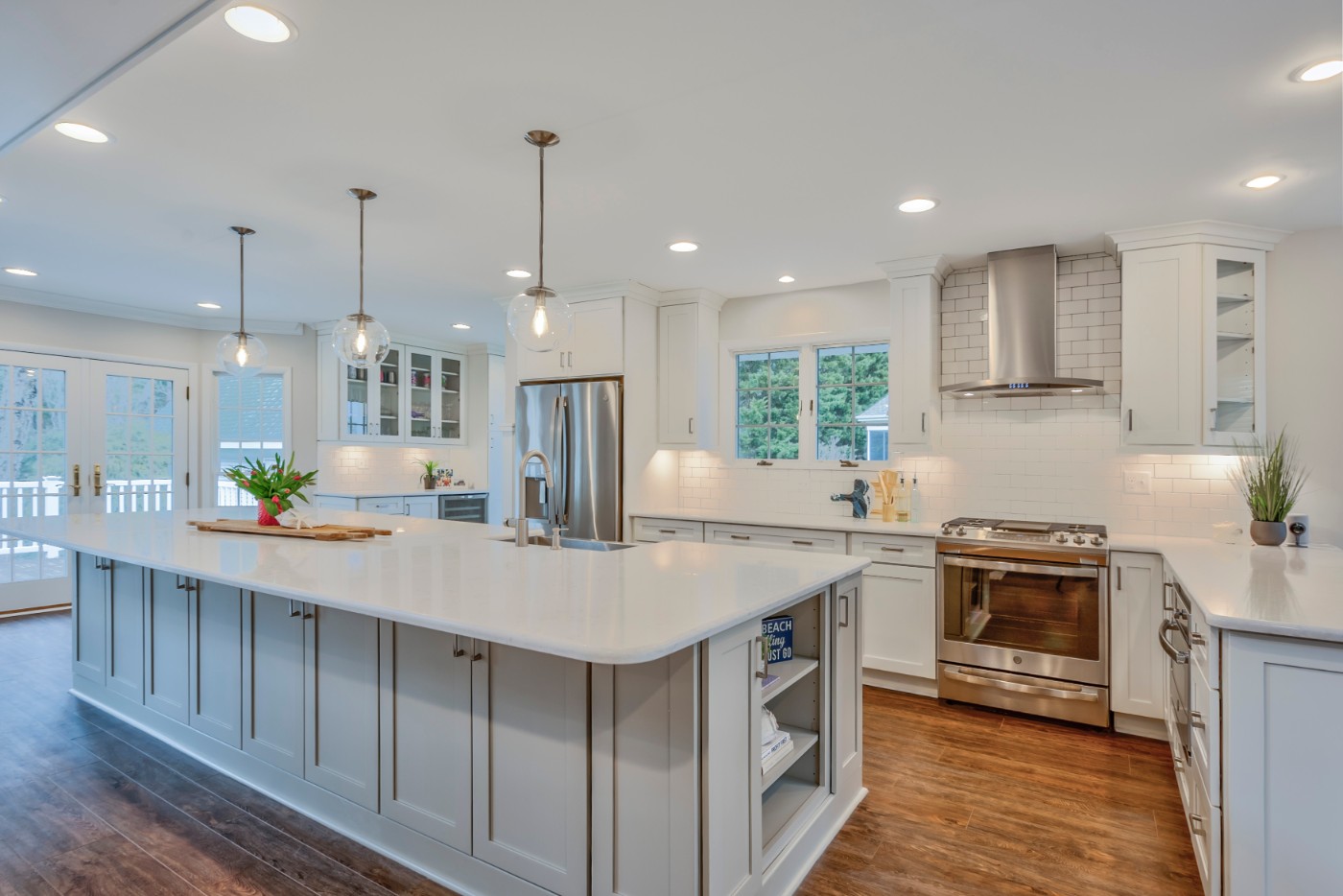 Canal Way Renovation in Bethany Beach DE - Kitchen with Center Island and Three Vintage Pendant Lights