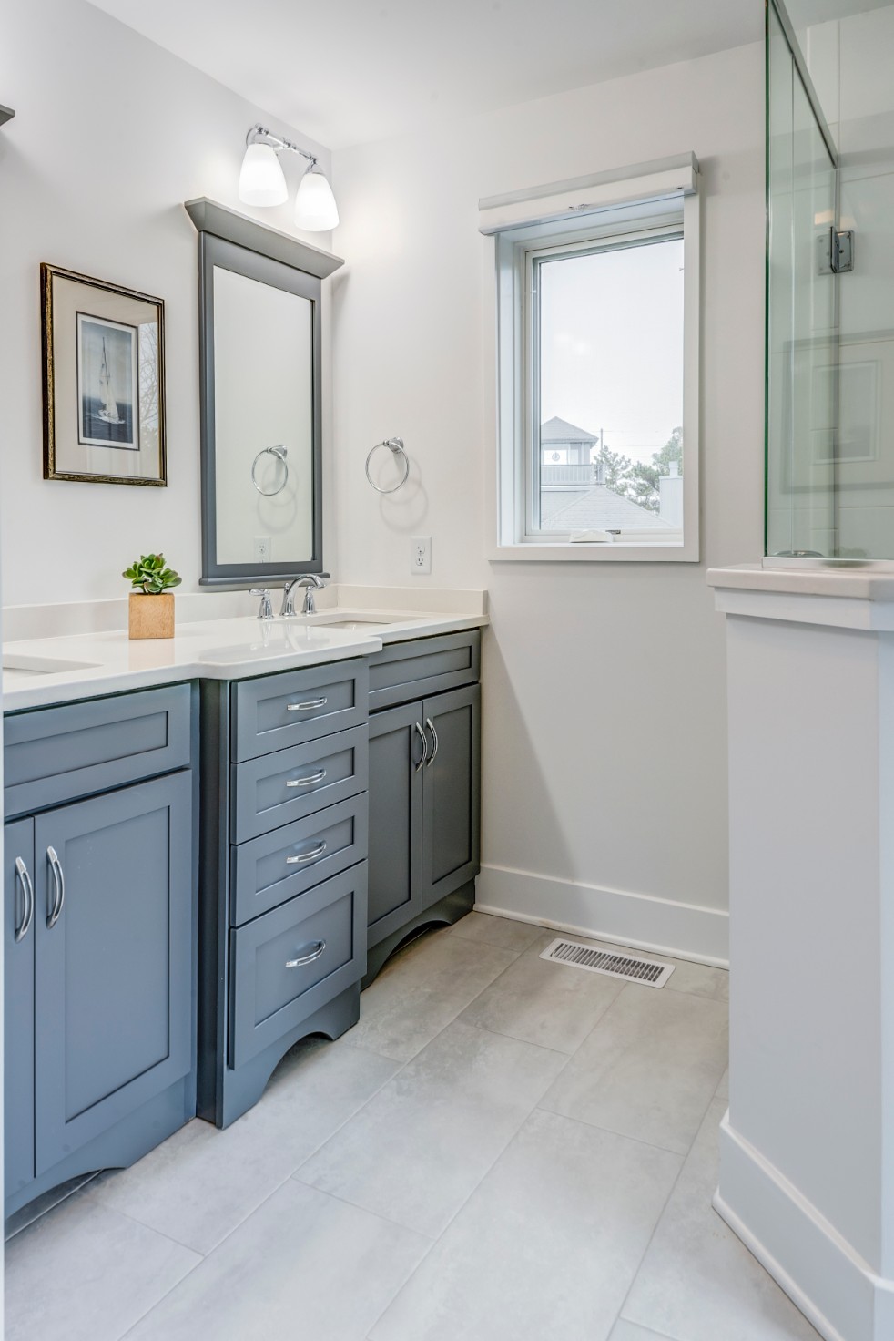 Cotton Patch Hills Renovation in Bethany Beach DE - Bathroom with White Wall Paint and Shaker Cabinets