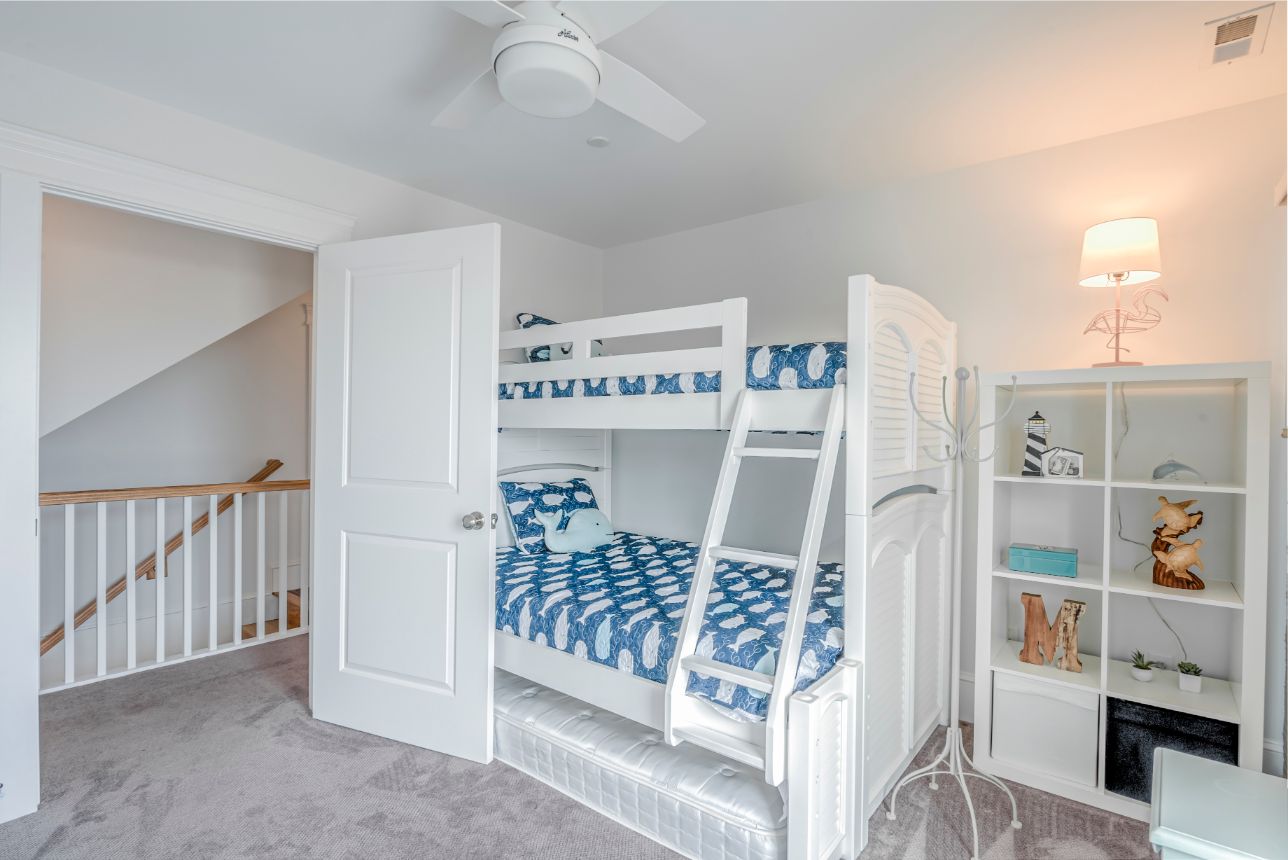 Kids Bedroom with Bunk Beds and Blue Bed Covers