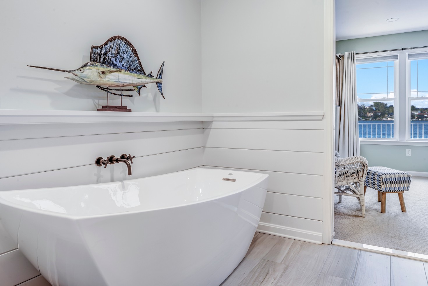 Hatteras Drive Bathroom Remodel in Bethany Beach DE - Master Bathroom with White Free Standing Bathtub and Marlin