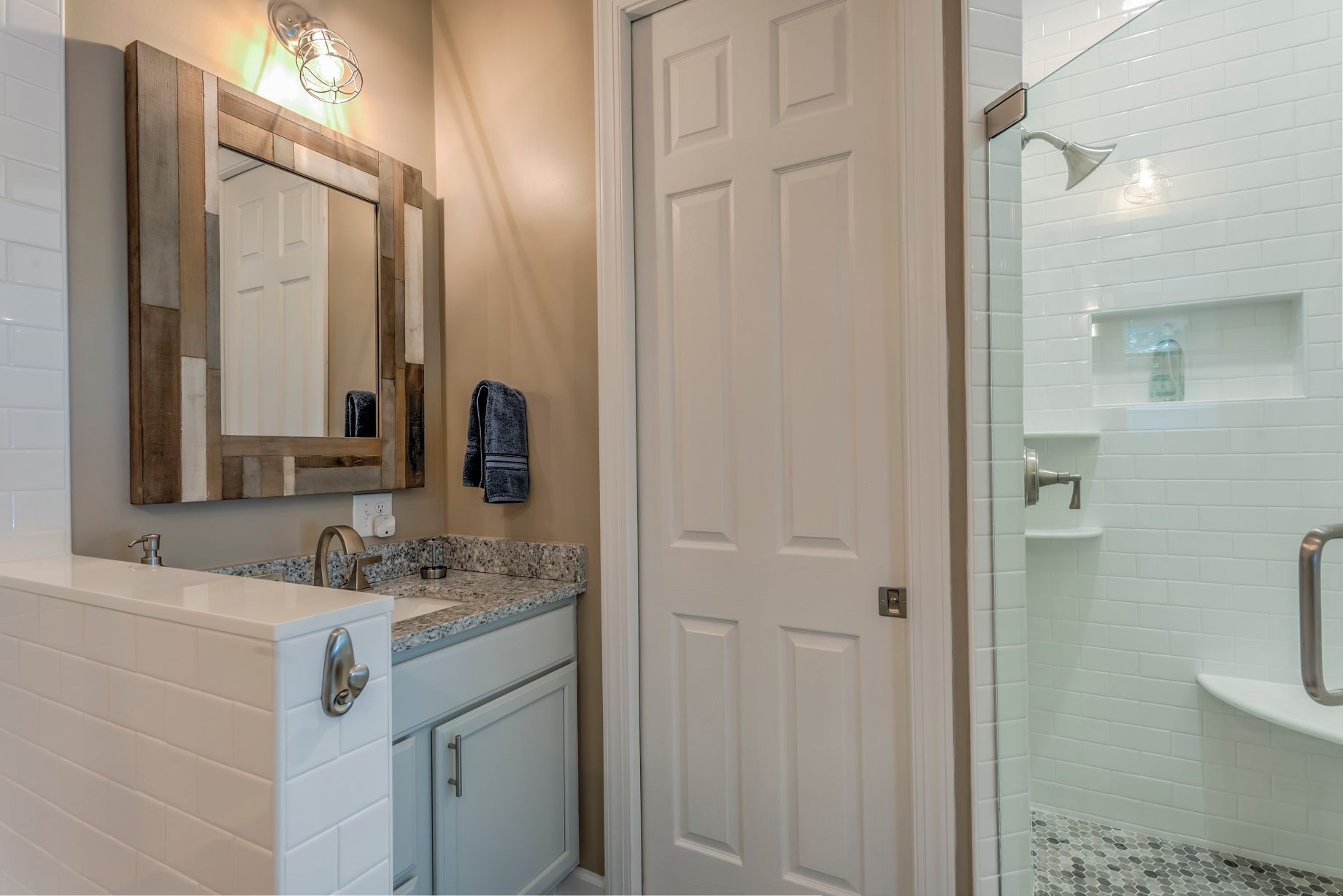 Addition in Juniper Court, Ocean Pines MD - Bathroom with Compact Sink and Large Square Mirror with Mosaic Frame