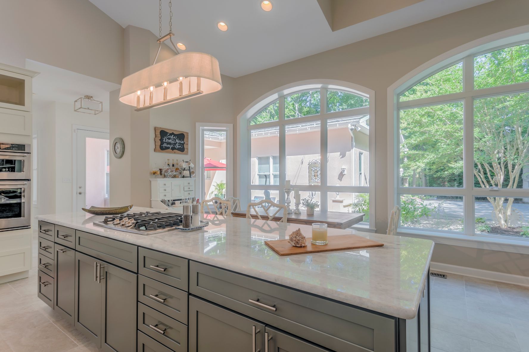 Kitchen in Juniper Court, Ocean Pines MD with Center Island and Vintage Lights