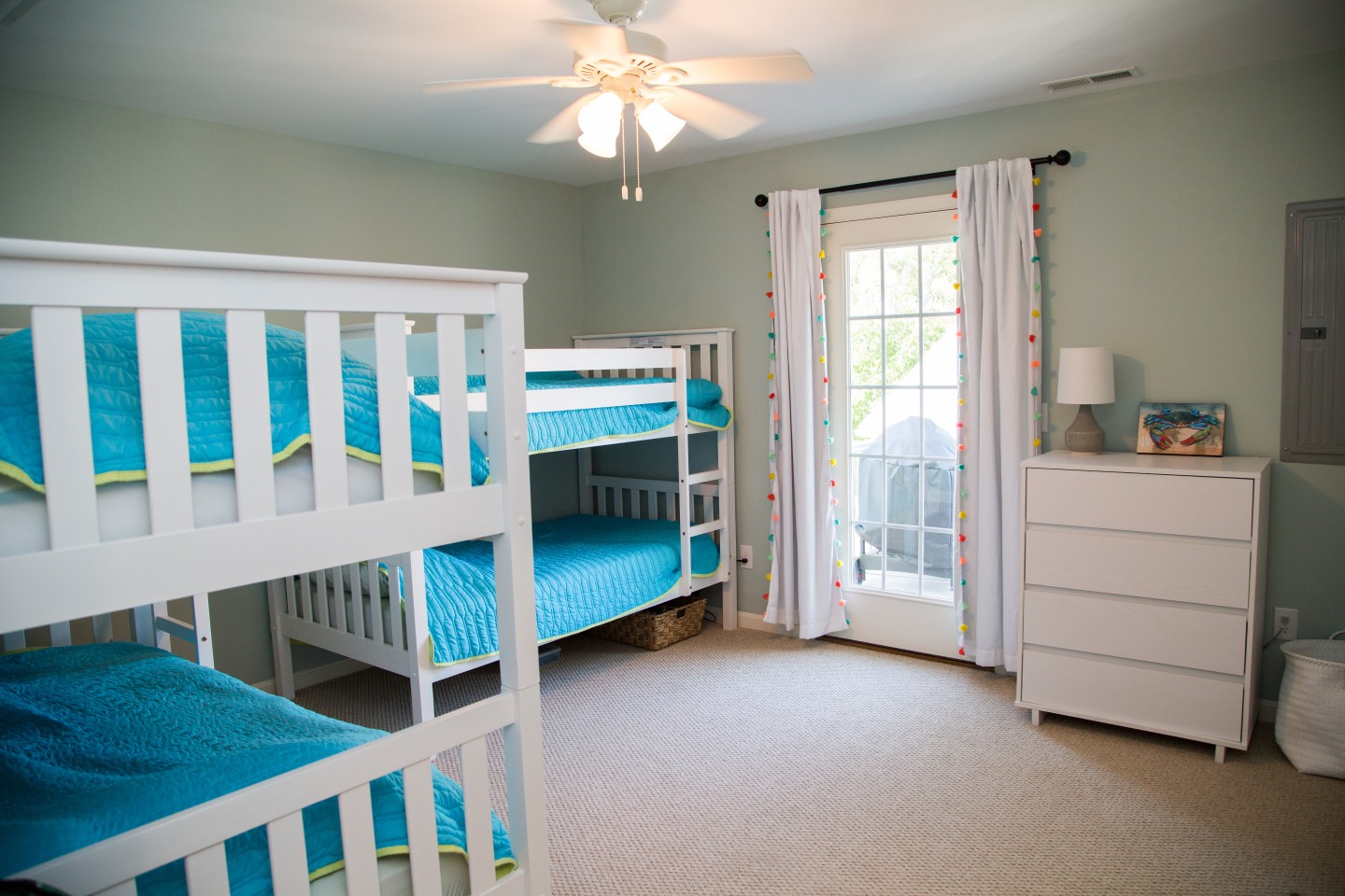 Kids Bedroom with Bunk Beds, Light Carpet and Large Window