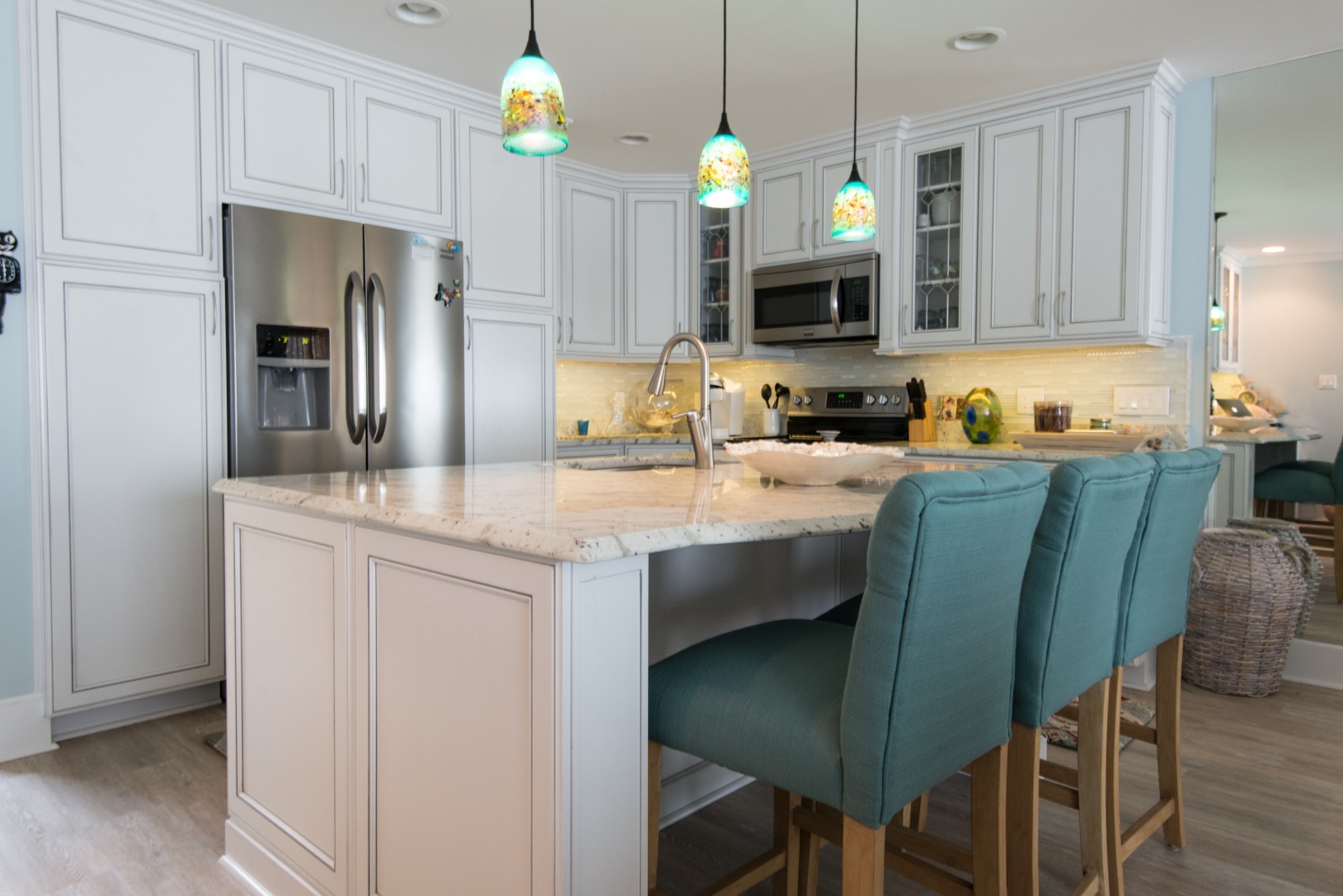 Kings Grant Renovation Vol.1 Kitchen with Center Island, Andromeda White Granite Countertop, Three-Light Pendant and White Cabinets
