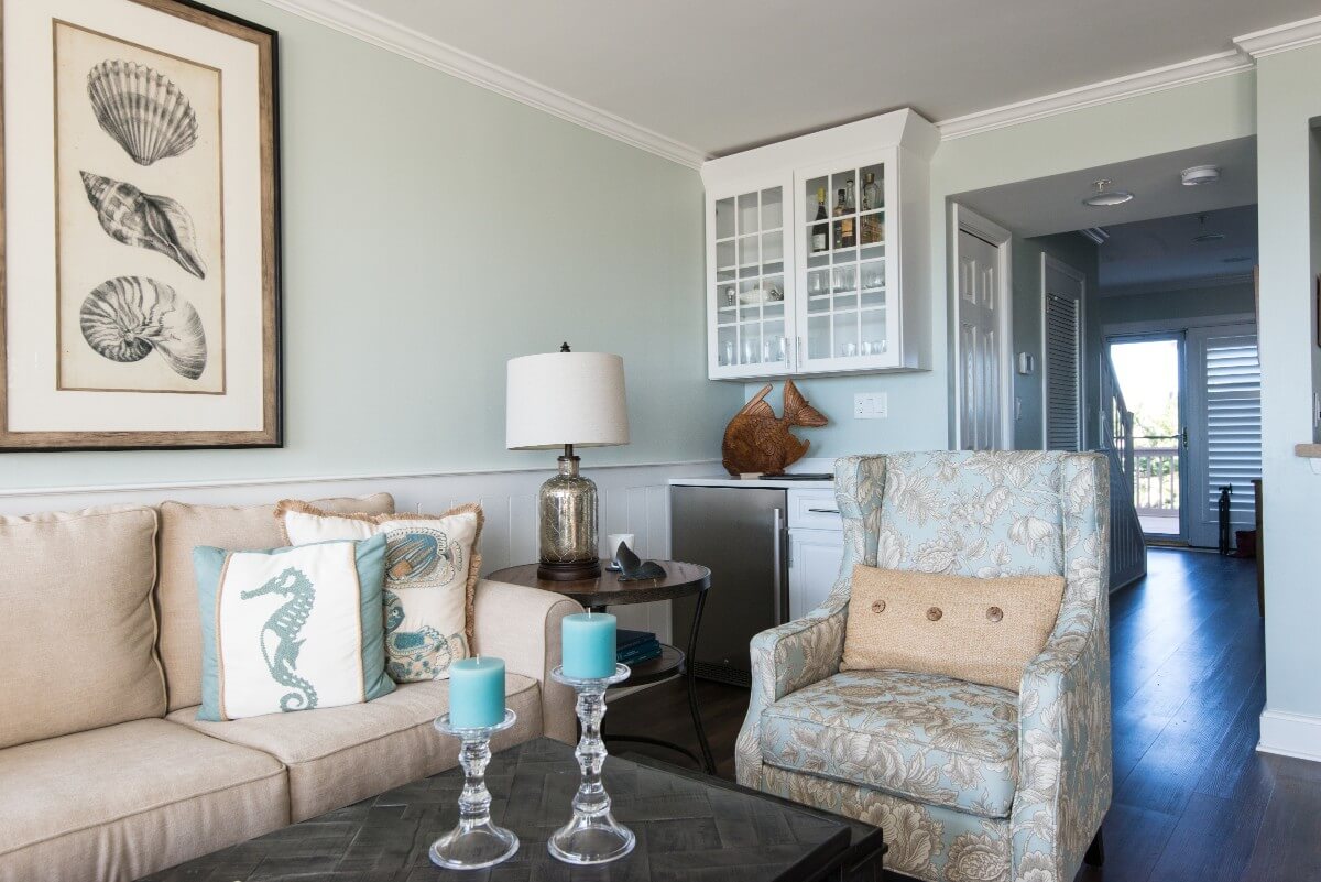 Kings Grant Renovation Vol.3 Fenwick Island, DE Living Room with Vintage Furniture, White Glass Cabinet and Sea Decor