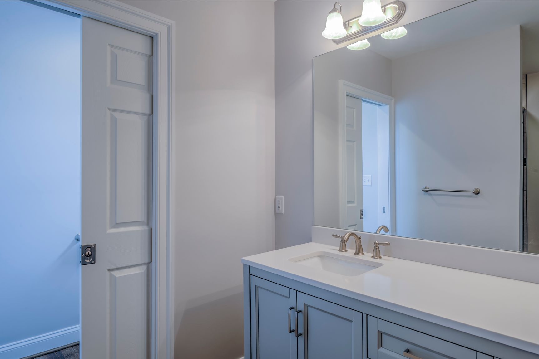 Bathroom Remodel in October Glory, Ocean View DE with Large Mirror and White Vanity Top