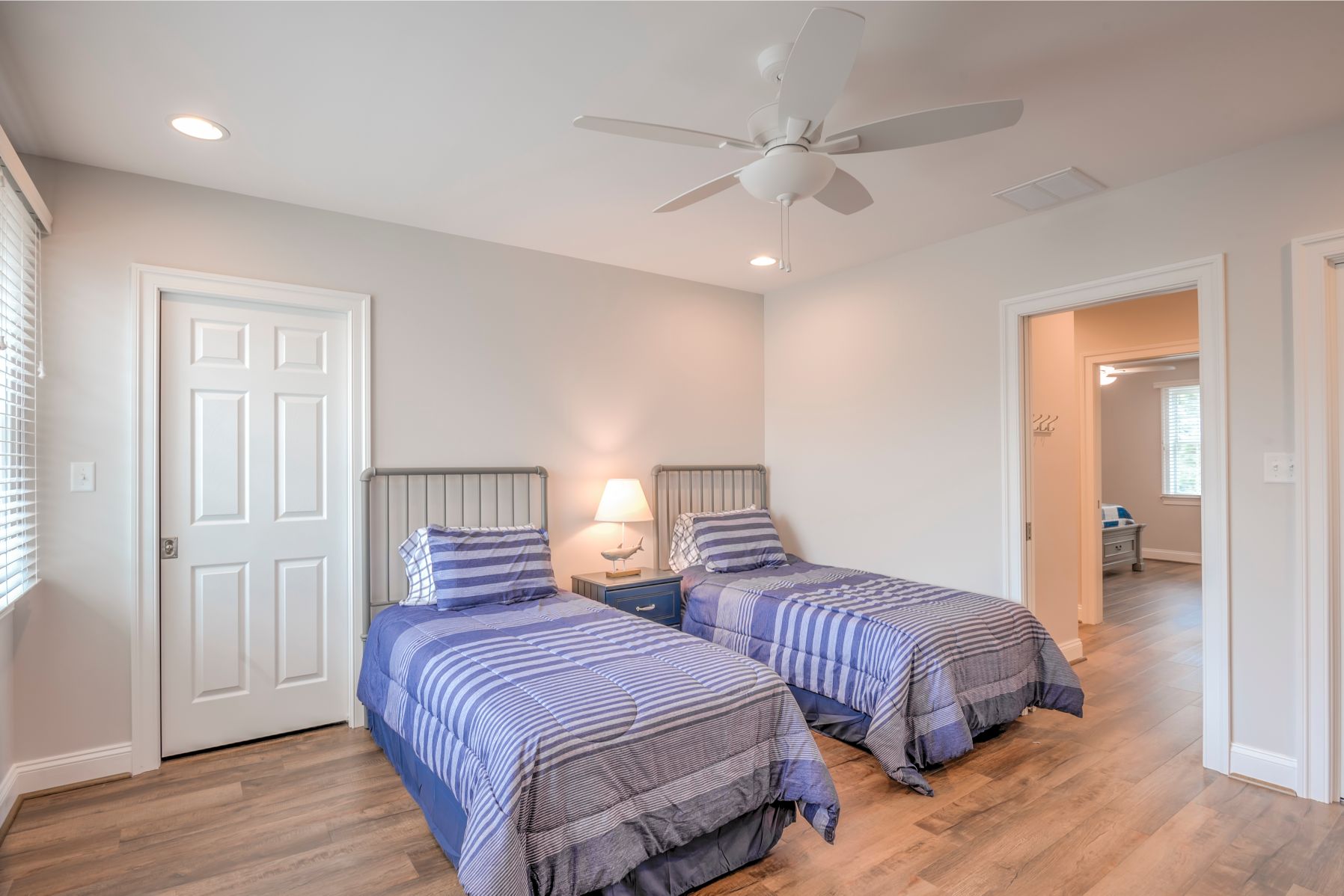 New Addition in October Glory, Ocean View DE - Guest Bedroom with White Ceiling Fan and Farmland Hickory Flooring