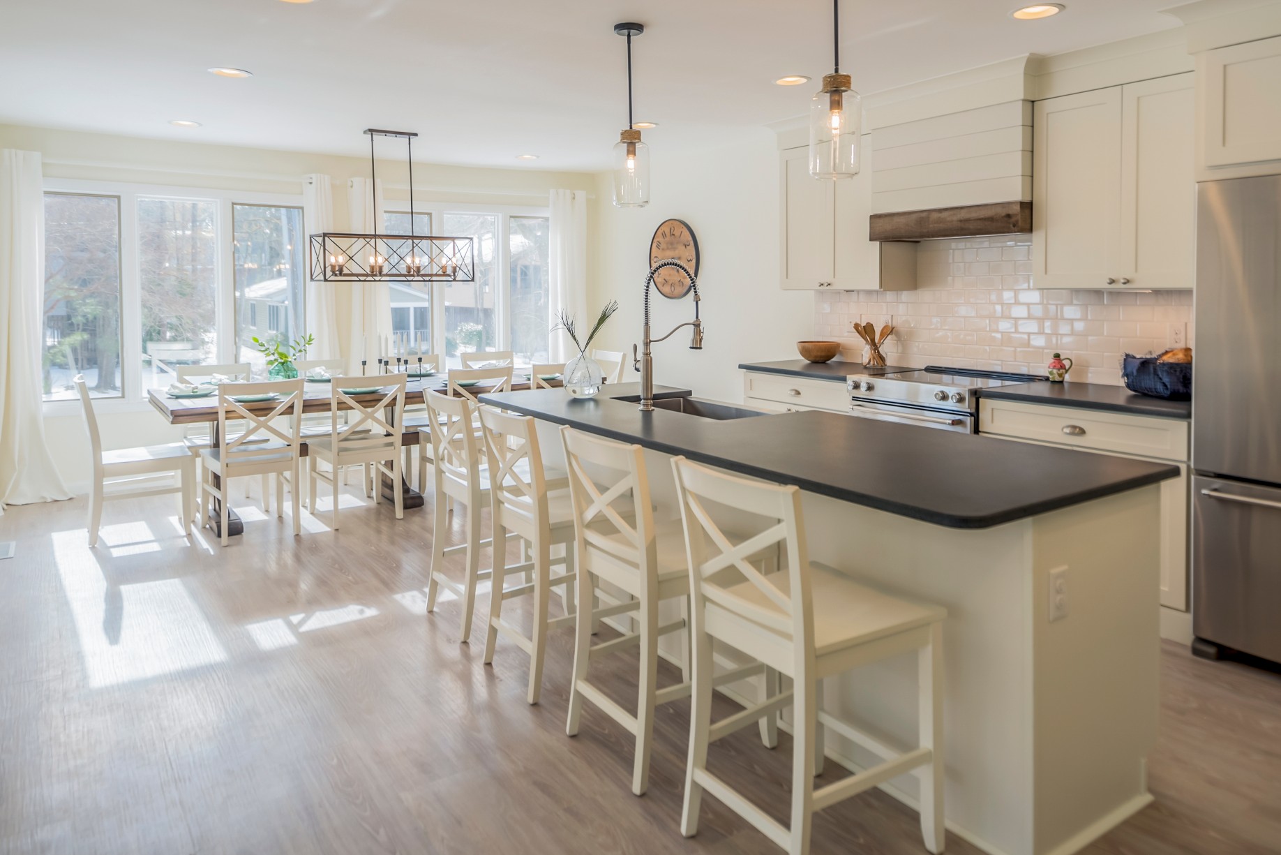 Modern Kitchen with Unique Center Island with Black Countertop in Wellington Parkway, Bethany Beach DE Renovation