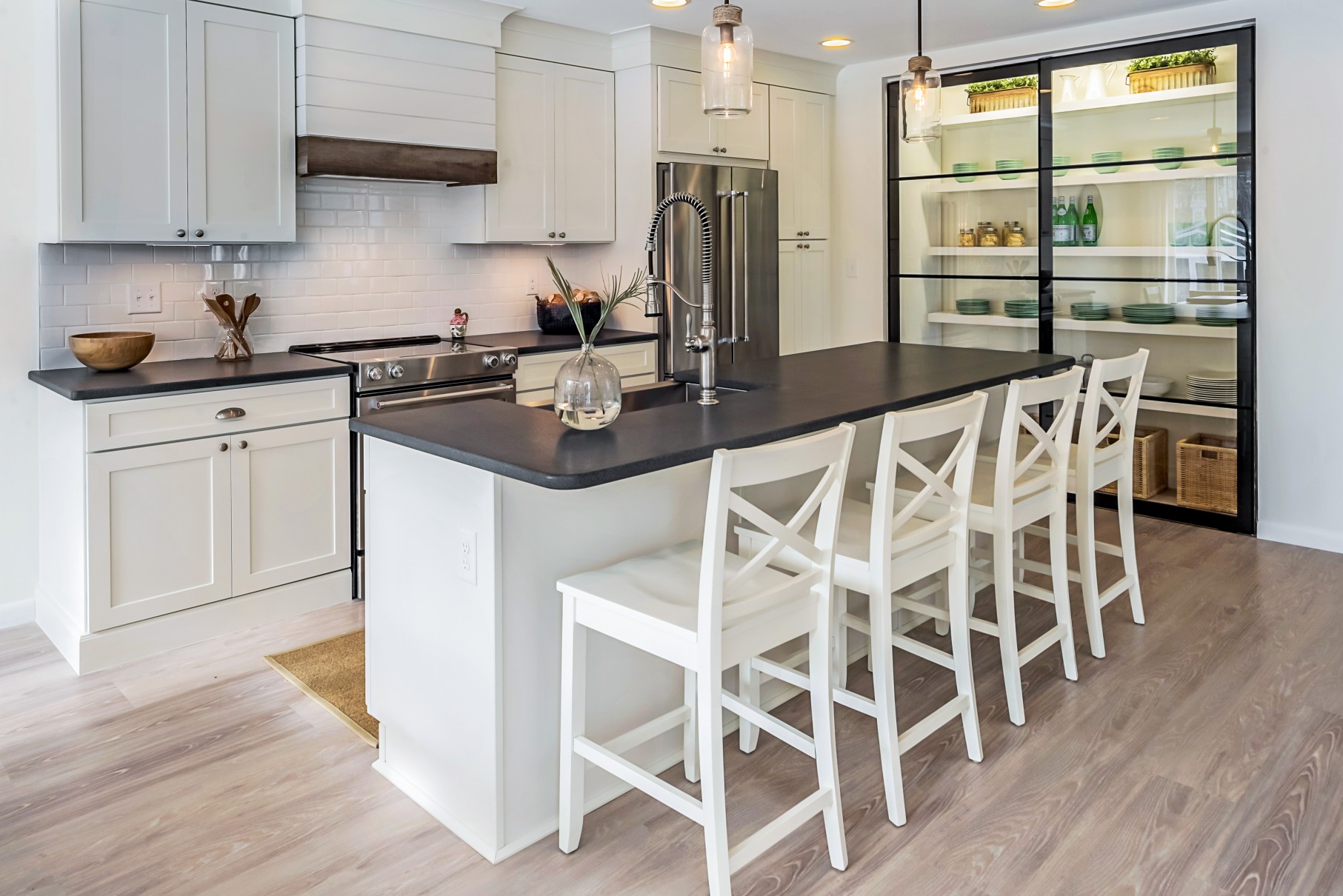 White Kitchen with Light Wood Flooring in Wellington Parkway, Bethany Beach DE Renovation