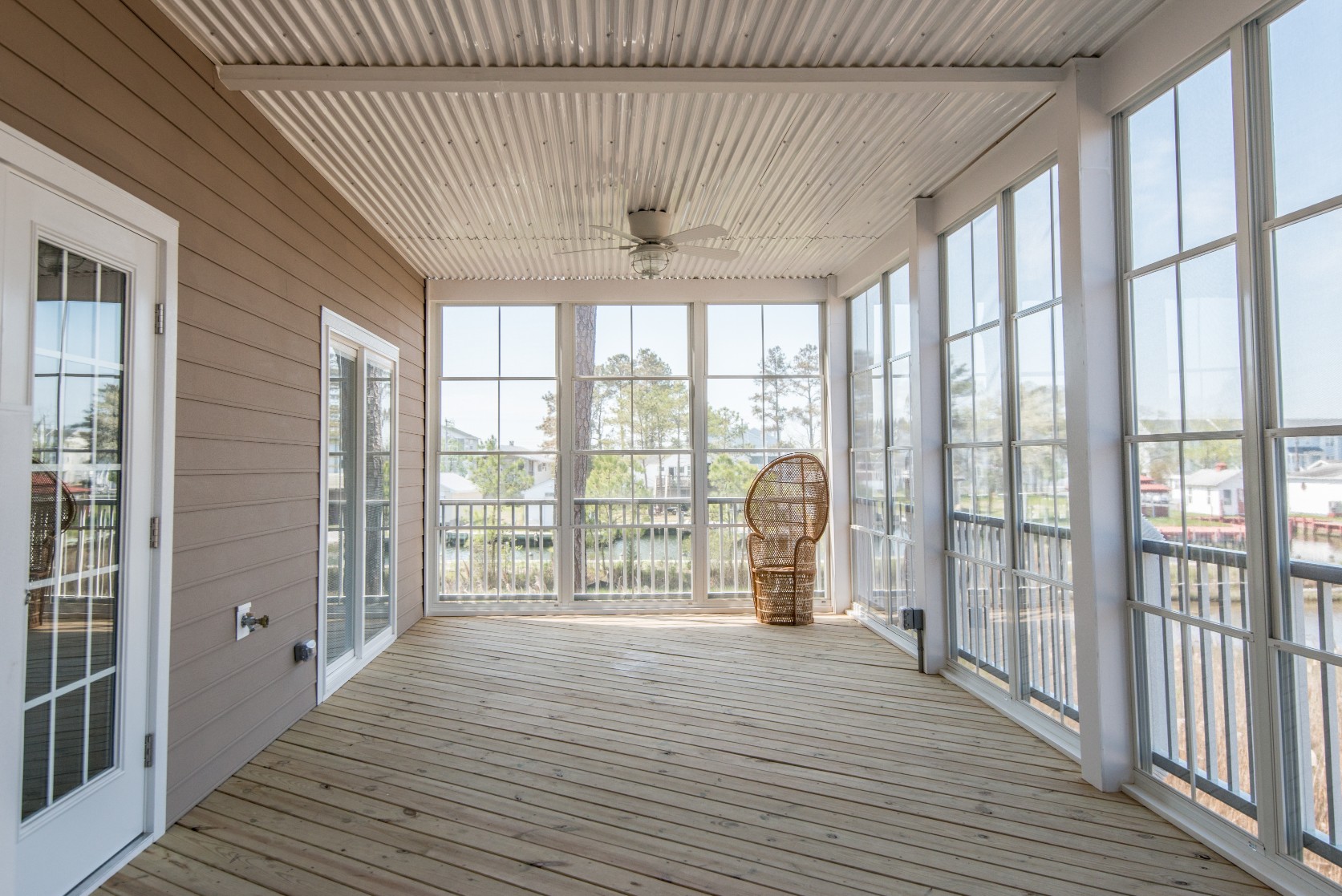 Whitesview Court Sunroom in Ocean View DE Four Season Sunroom with Storm Door and Ceiling Fan